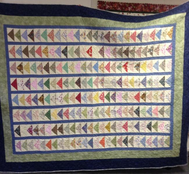 Loretta's Scrappy Flying Geese Quilt